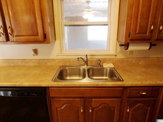 kitchen with black dishwasher and sink