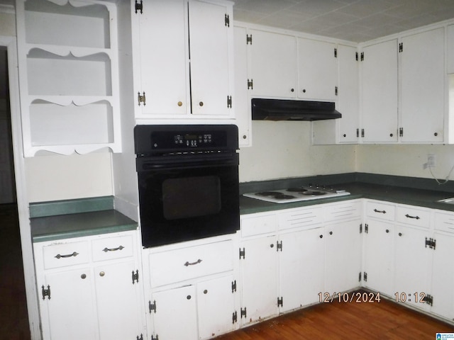 kitchen featuring white cabinets, oven, dark hardwood / wood-style floors, and white gas cooktop