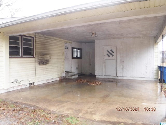 garage featuring a carport