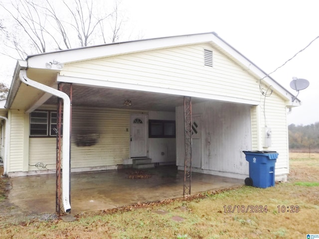 view of front of house featuring a carport