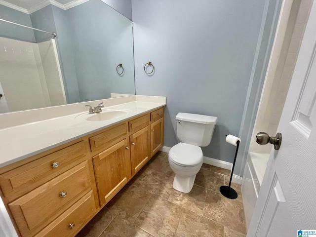 bathroom featuring vanity, toilet, and crown molding