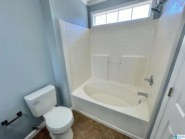 bathroom with bathtub / shower combination and toilet