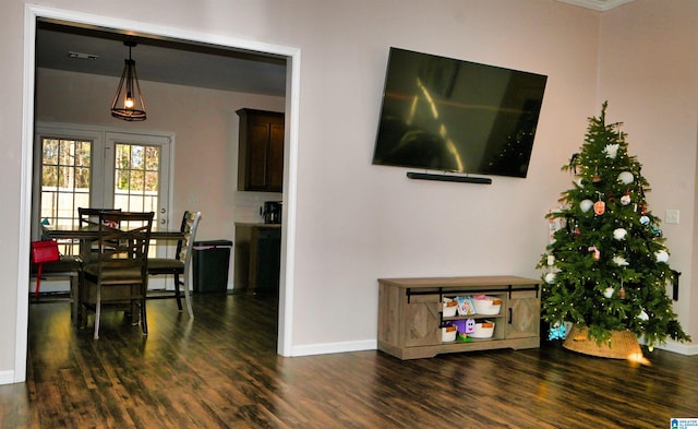 interior space with dark hardwood / wood-style flooring