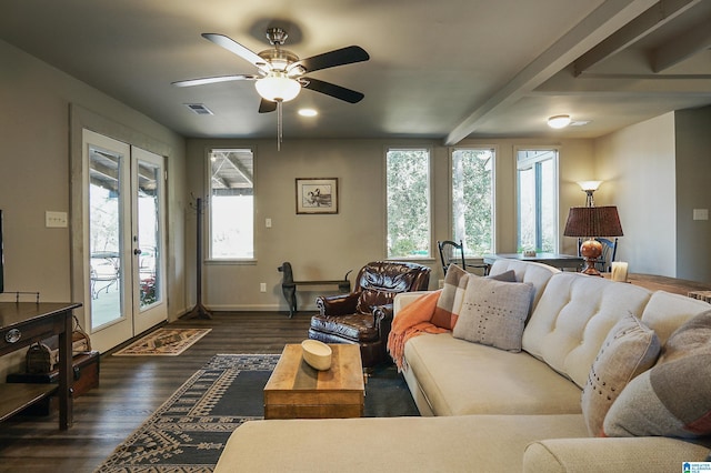 living room with ceiling fan, french doors, beamed ceiling, and dark hardwood / wood-style floors