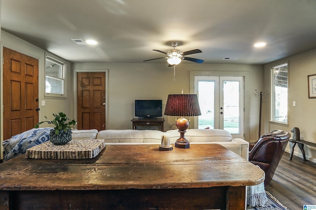 living room featuring french doors, dark hardwood / wood-style flooring, and ceiling fan