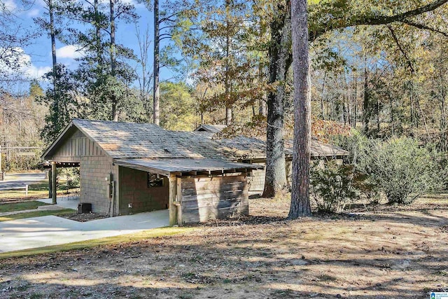 exterior space with a carport