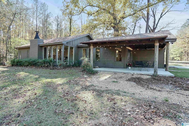 rear view of house with a patio area