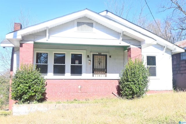 bungalow-style home featuring a porch