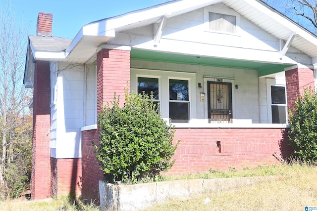 bungalow-style home with covered porch