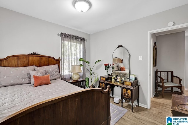 bedroom featuring light hardwood / wood-style floors