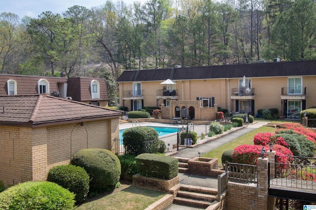 view of swimming pool with a patio