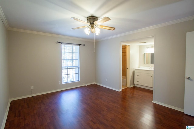 unfurnished bedroom with connected bathroom, ceiling fan, dark hardwood / wood-style flooring, and crown molding