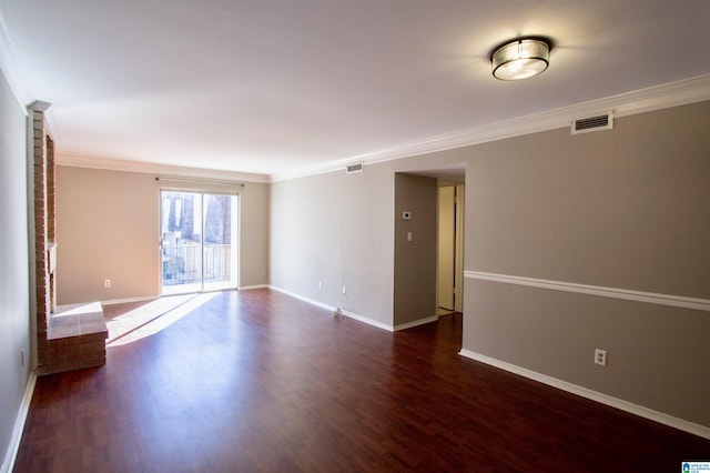 unfurnished room with a fireplace, dark hardwood / wood-style flooring, and ornamental molding