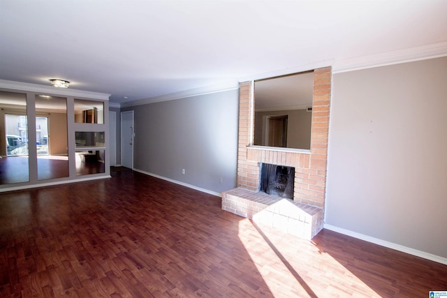 unfurnished living room with crown molding, a fireplace, and hardwood / wood-style flooring