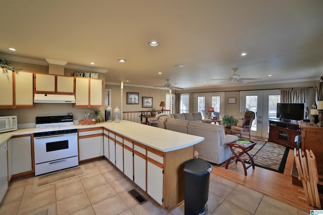 kitchen featuring kitchen peninsula, white appliances, ceiling fan, crown molding, and light hardwood / wood-style floors