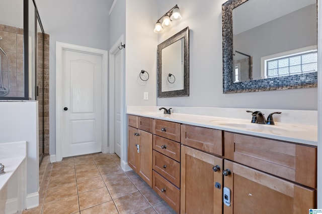 bathroom featuring tile patterned flooring, vanity, and independent shower and bath