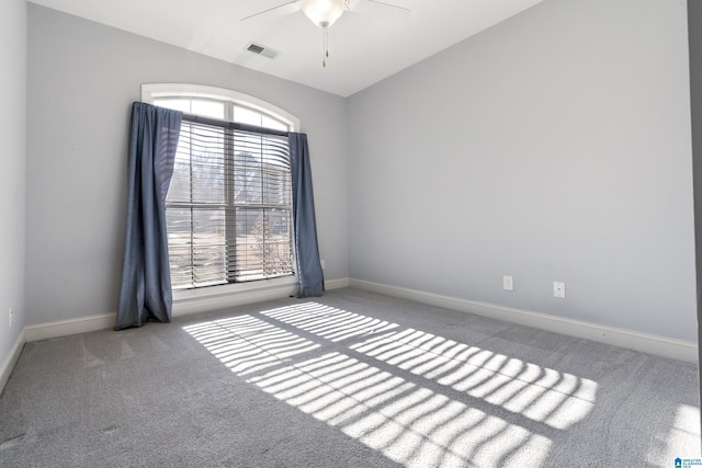 unfurnished room featuring ceiling fan, lofted ceiling, and light carpet