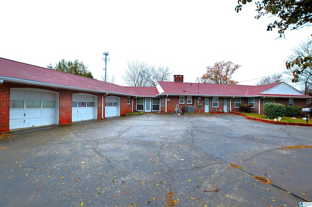 single story home with a garage