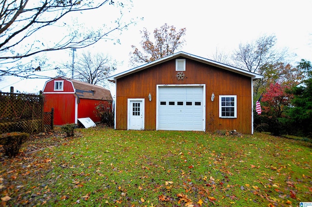 garage with a lawn