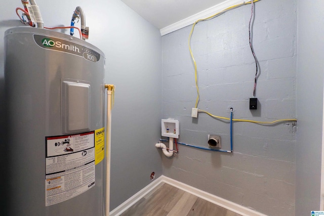 utility room featuring electric water heater