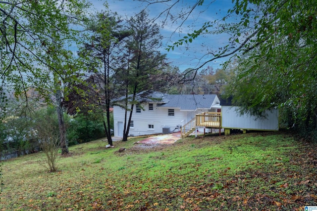 view of yard featuring a wooden deck