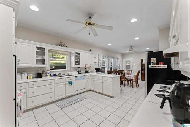 kitchen featuring dishwasher, white cabinets, and ceiling fan