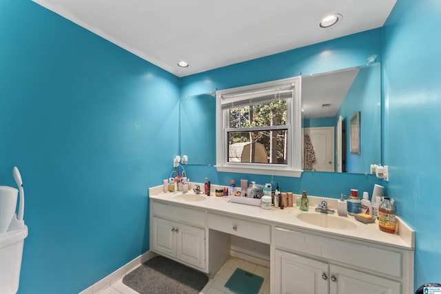 bathroom featuring tile patterned floors and vanity