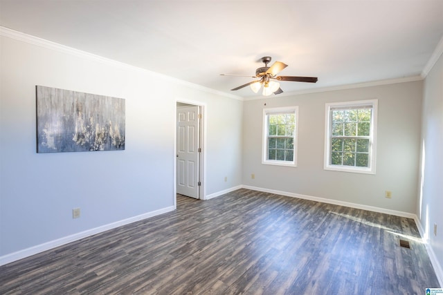 spare room with ceiling fan, dark wood-type flooring, and ornamental molding