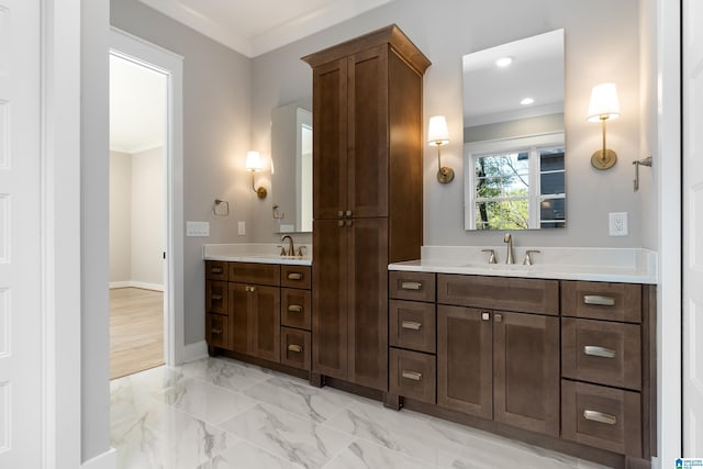 bathroom with vanity and crown molding