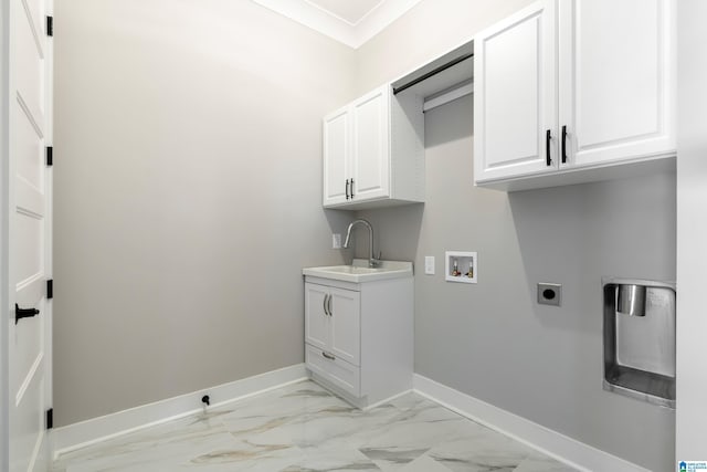 laundry area featuring cabinets, sink, hookup for a washing machine, ornamental molding, and hookup for an electric dryer