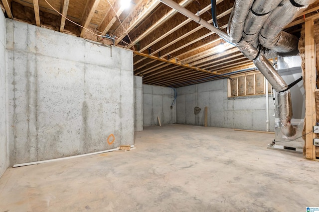 basement featuring heating unit