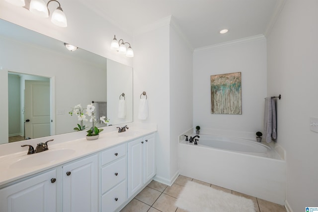 bathroom with tile patterned floors, a tub, crown molding, and vanity