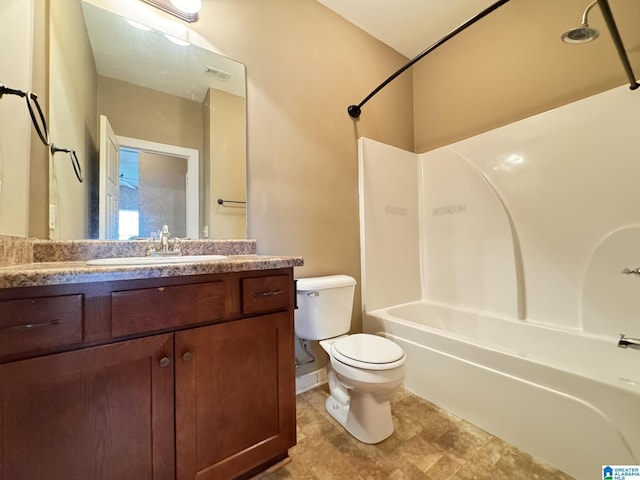 full bathroom featuring vanity,  shower combination, and toilet