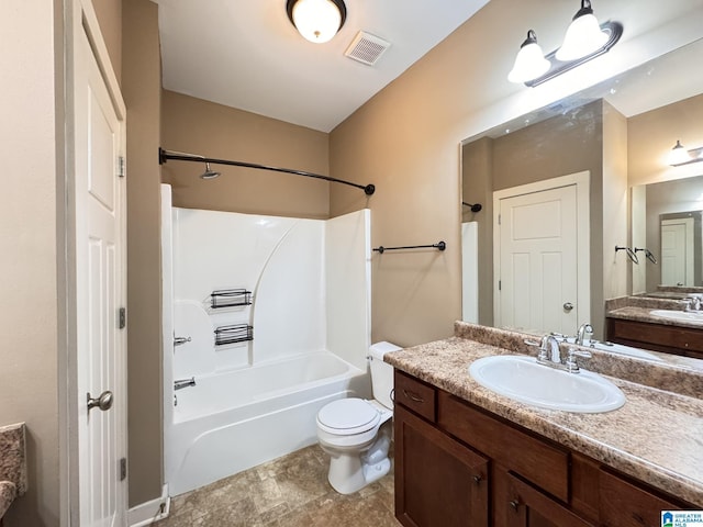 full bathroom with vanity, toilet, and washtub / shower combination