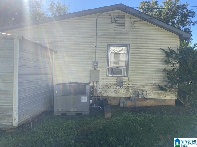 view of home's exterior featuring central AC unit