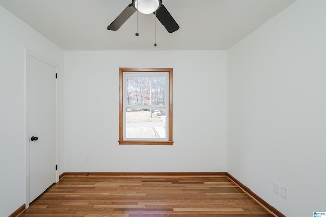 unfurnished room featuring ceiling fan and light hardwood / wood-style flooring