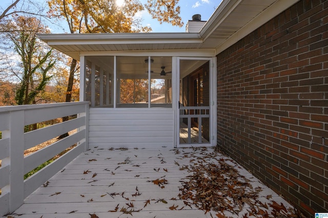 wooden terrace with a sunroom