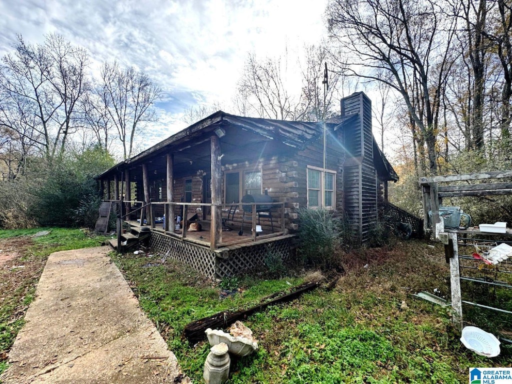 view of home's exterior featuring a deck