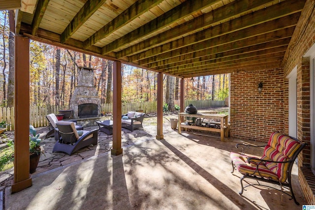 view of patio / terrace featuring an outdoor living space with a fireplace