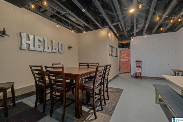 dining area with concrete floors