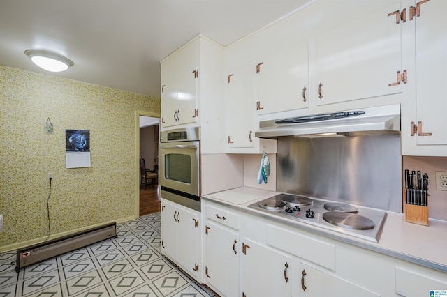 kitchen featuring white cabinetry, light tile patterned flooring, a baseboard radiator, and appliances with stainless steel finishes