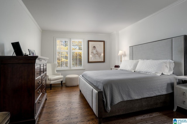 bedroom featuring dark hardwood / wood-style floors and ornamental molding