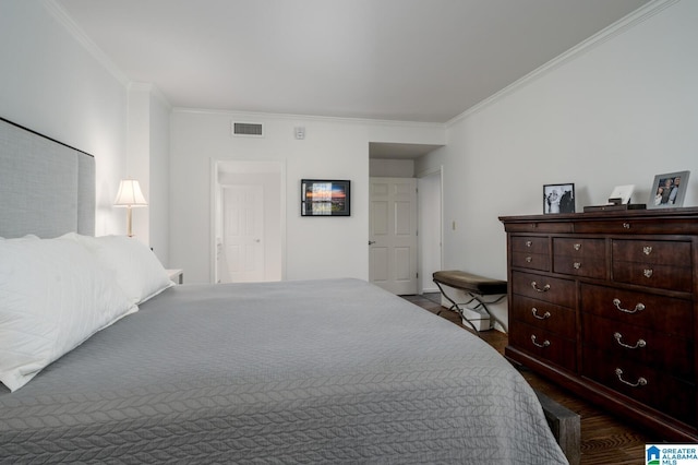 bedroom with crown molding