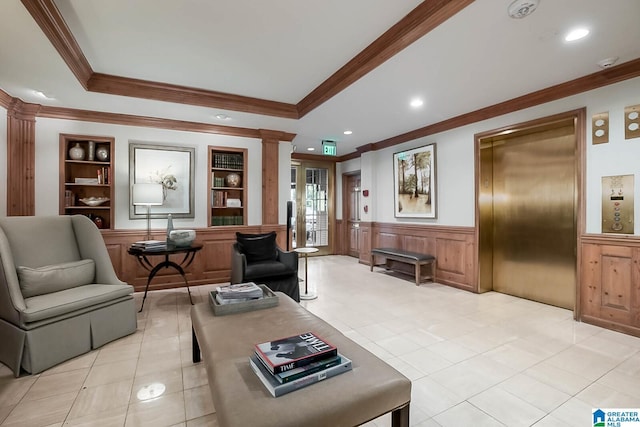 living room with decorative columns, ornamental molding, built in shelves, light tile patterned floors, and elevator