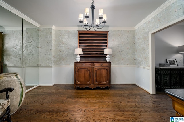 interior space featuring crown molding, dark hardwood / wood-style flooring, and a notable chandelier