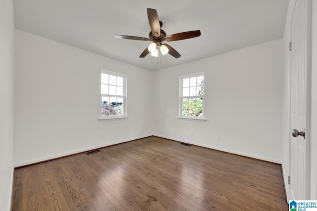 spare room featuring ceiling fan and wood-type flooring