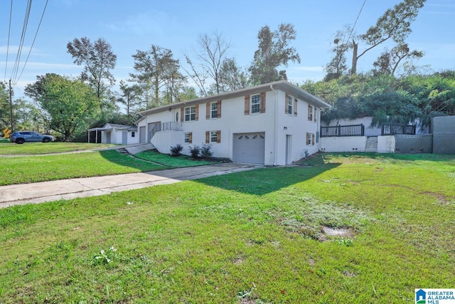 view of front facade featuring a garage and a front yard