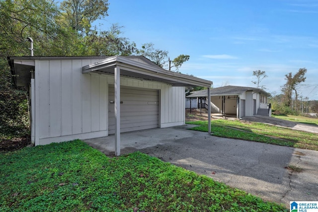 garage featuring a carport