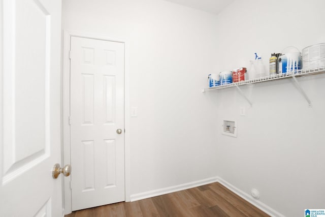 laundry room featuring hookup for a washing machine and dark wood-type flooring