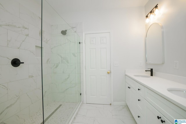 bathroom featuring a tile shower and vanity